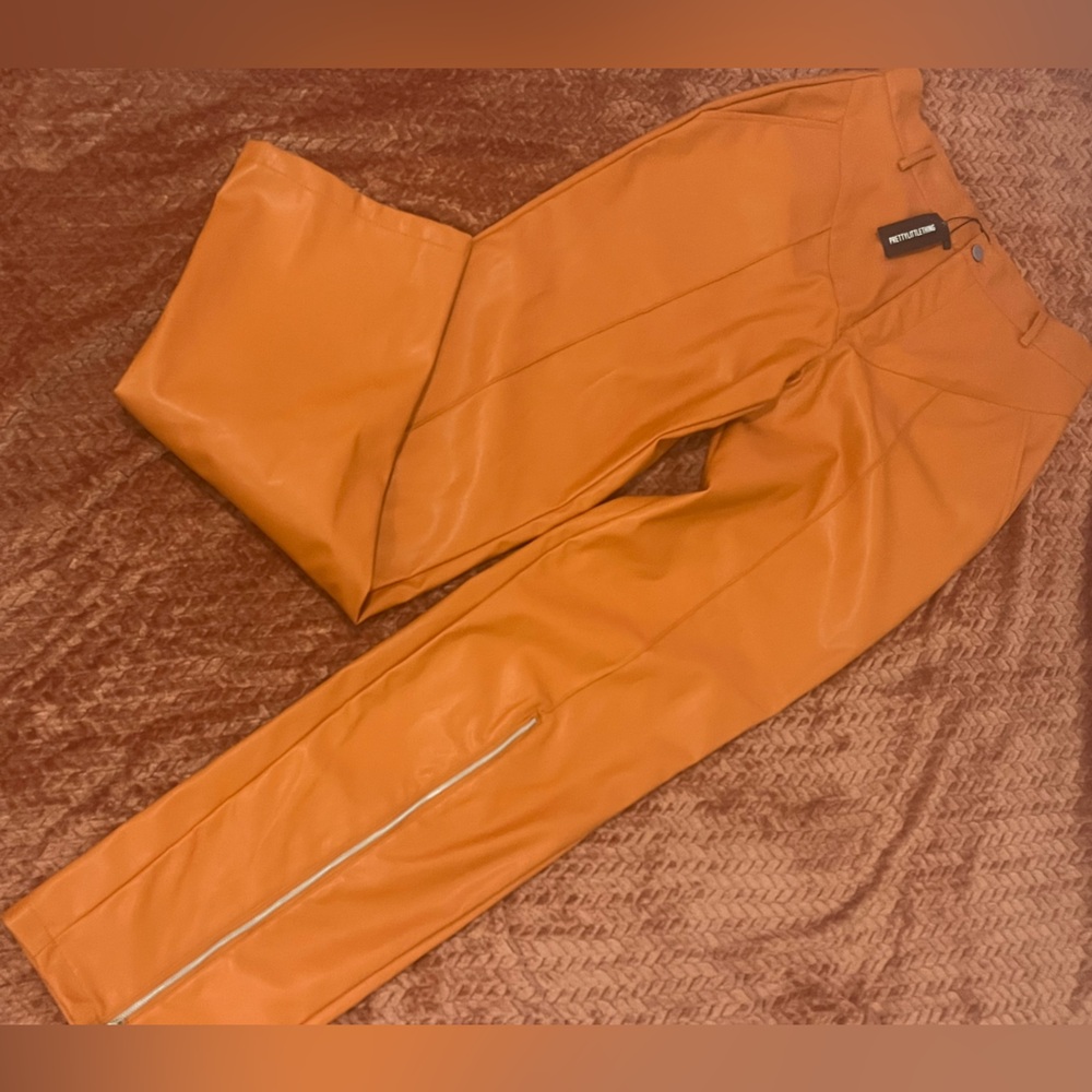 Pretty Little Thing PLT Orange Faux Leather Zip Pants